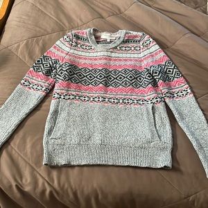 Victoria’s Secret sweater.